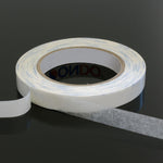 Double-sided adhesive tape for rubber and metal